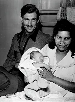 Moustache Prints: Proud: Middleweight boxer Don 'Bronco' Johnson and his wife with their baby son