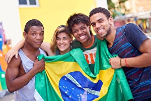 Informal Prints: Proud of their nation. Portrait of a group of teenagers holding up the Brazilian flag