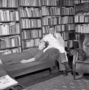 Mind Prints: At the Psychologist. A woman is lying on a couch in a psychologist