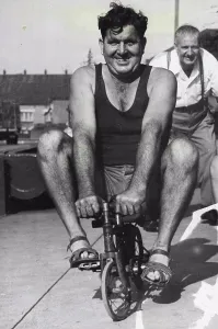 Petite Prints: Publican George Lloyd training on a miniature bicycle for the publicans Cycle Derby to be held at Sydney Sports Ground