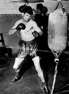1950 Prints: Only the punching bag lasted more than three rounds while Johnson trained for his first five Sydney fights