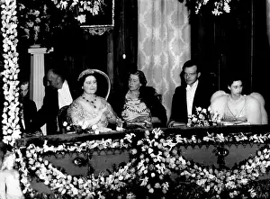 1950 Prints: Queen And Princess Margaret At Covent Garden -- The Queen (left foreground) and Princess Margaret (right foreground)