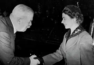 Visit Prints: The Queen Visits London Hospital -- The Queen wore a Persian-lamb over collar with a ***** when she visited the London