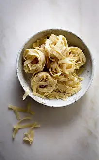 Ingredient Prints: Raw pasta in a ceramic bowl