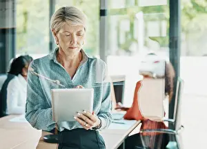Expert Prints: Reading, online and mature woman with tablet