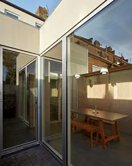 Terrace Prints: Rear extension exterior facade with view through glass doors to dining space
