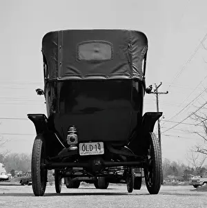 Roadway Prints: Rear view of old fashion Ford