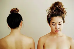 Side By Side Prints: Front and rear view of shoulders of naked women