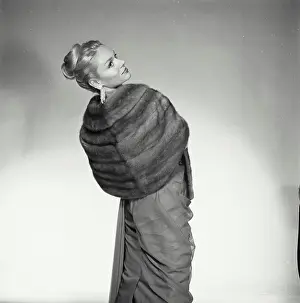 Hair Bun Prints: Rear view of a young woman standing