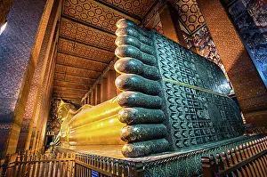 Faith Prints: Reclining Buddha statue, mother of pearl inlays on the soles of the feet
