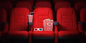 Video Prints: Red cinema seats and cola, popcorn and glasses in empty theater