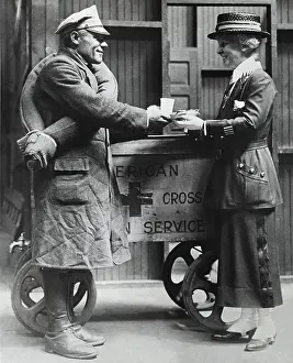 50 55 Years Prints: Red Cross worker giving food to a Polish-American soldier, 1918