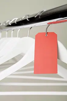 Label Prints: Red label on a clothes hanger