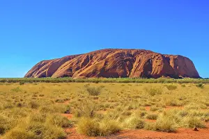 Rock Formation Prints: Red sand of Australian Outback at Ayers Rock in dry season