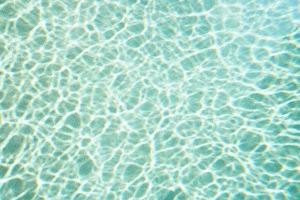 Swimming Pool Prints: Reflection forming pattern over blue swimming pool water