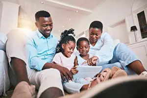 Games Prints: Relax, streaming and tablet with black family in living room for happy