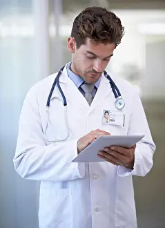 Doctors Prints: Research, tablet and doctor in hospital for medical information on the internet for diagnosis