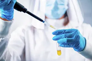 Gear Prints: Researcher pipetting a sample