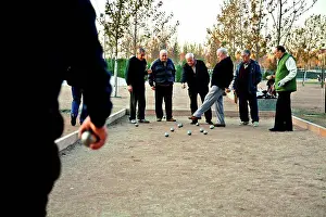 Retired Prints: Retired playing Petanca in Madrid Rio park, Madrid, Spain