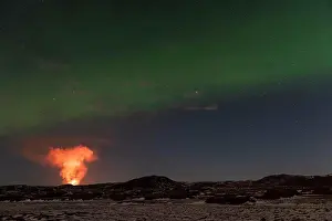 Dangerous Prints: Reykjanes Peninsula, Iceland - March 31th 2021: Geldingadalir eruption and Northern Lights