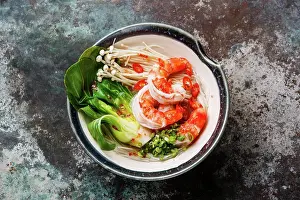 Seafood Prints: Rice noodles with Shrimps, Bok choy cabbage and Enoki mushrooms on metal background