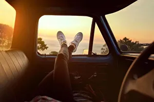 Architecture Prints: Roadtrip chill. Cropped shot of an unrecognizable woman lying in a car during a roadtrip