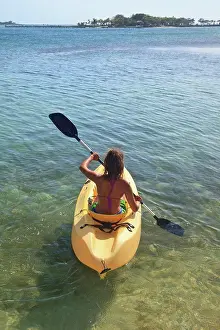 Paddle Prints: Roatan, Bay Islands, Honduras, A Young Woman Paddling A Kayak At Anthony´s Key Resort