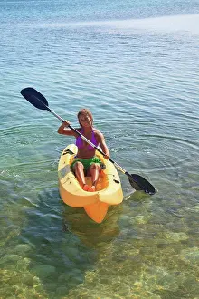 Visitor Prints: Roatan, Bay Islands, Honduras, A Young Woman Paddling A Kayak At Anthony´s Key Resort