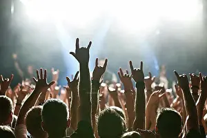 Luminous Prints: Rocker greeting from fans at rock concert