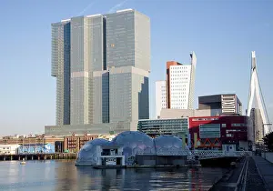 Harbor Prints: De Rotterdam building designed by architect Rem Koolhaas as a vertical city nears completion in August 2013