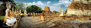 Out Door Prints: Row of seated Buddha statues and ancient temple ruins