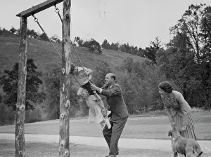 Monarchy Prints: Royal Family At BalmoralThe Duke of Edinburgh provides the'Push' for Prince Charles