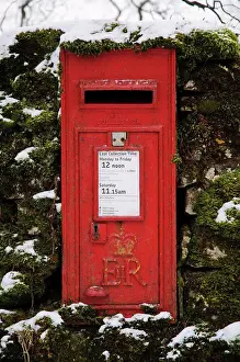 Weather Prints: Royal Mail wall box postbox in moss covered wall with snow