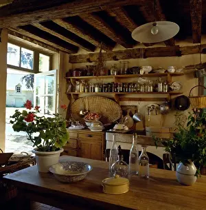 Beams Prints: Rustic cottage kitchen with wooden table and shelving