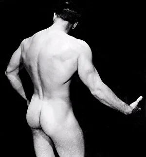1950 Prints: San Francisco, California: c. 1950 A male bodybuilder poses nude from the back