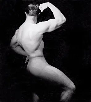 1950 Prints: San Francisco, California: c. 1950 A male bodybuilder poses nude from the side