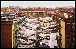 Laundry Prints: San Francisco street scene showing washing drying between tenement buildings 1900