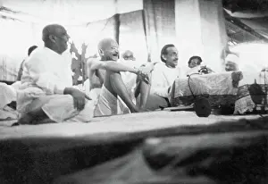 Global Prints: Sardar Vallabhbhai Patel, Mahatma Gandhi and Acharya Kripalani laughing heartily in a congress meeting