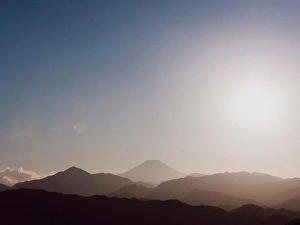 Remote Location Prints: Scenic tranquil silhouette view Mount Fuji at sunrise
