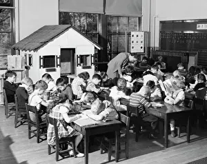 Student Prints: School children studying in a classroom with their teacher