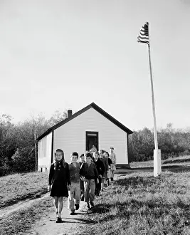 Schoolgirl Prints: School children walking out of their school building, Massachusetts, USA