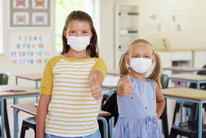 Students Prints: School kids, thumbs up and healthy students wearing masks in a classroom protecting against covid