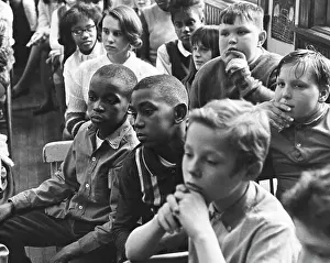 Boredom Prints: Schoolboys and schoolgirls in a classroom