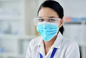 Innovation Prints: Science, woman and face mask with goggles working on medical research
