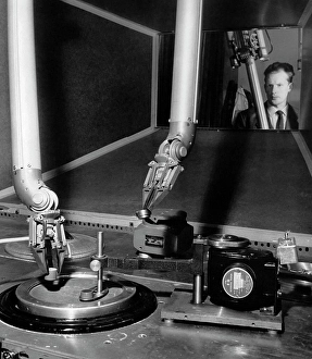 Robot Prints: Scientist observing laboratory equipment in a metallurgy laboratory