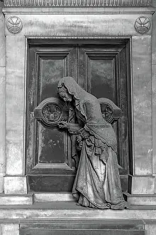 Genoa Prints: Sculpture of an old woman at a door with an hourglass