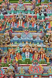 Gods Prints: Sculptures on Hindu temple gopura (tower). Menakshi Temple, Madurai, Tamil Nadu, India