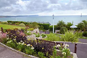 Cliffs Prints: A sea view from Greenhill Gardens above the seafront promenade at Weymouth on the Jurassic Coast in Dorset
