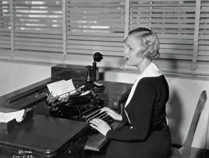 Secretary Prints: Secretary working in office