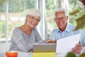 Invest Prints: Senior couple, tablet and paperwork for portrait with smile for profit